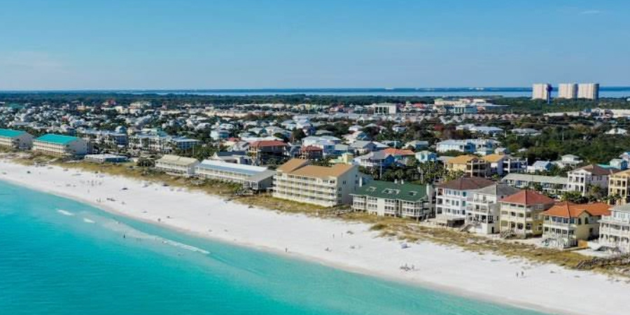 Aerial view of coastal homes along the beach